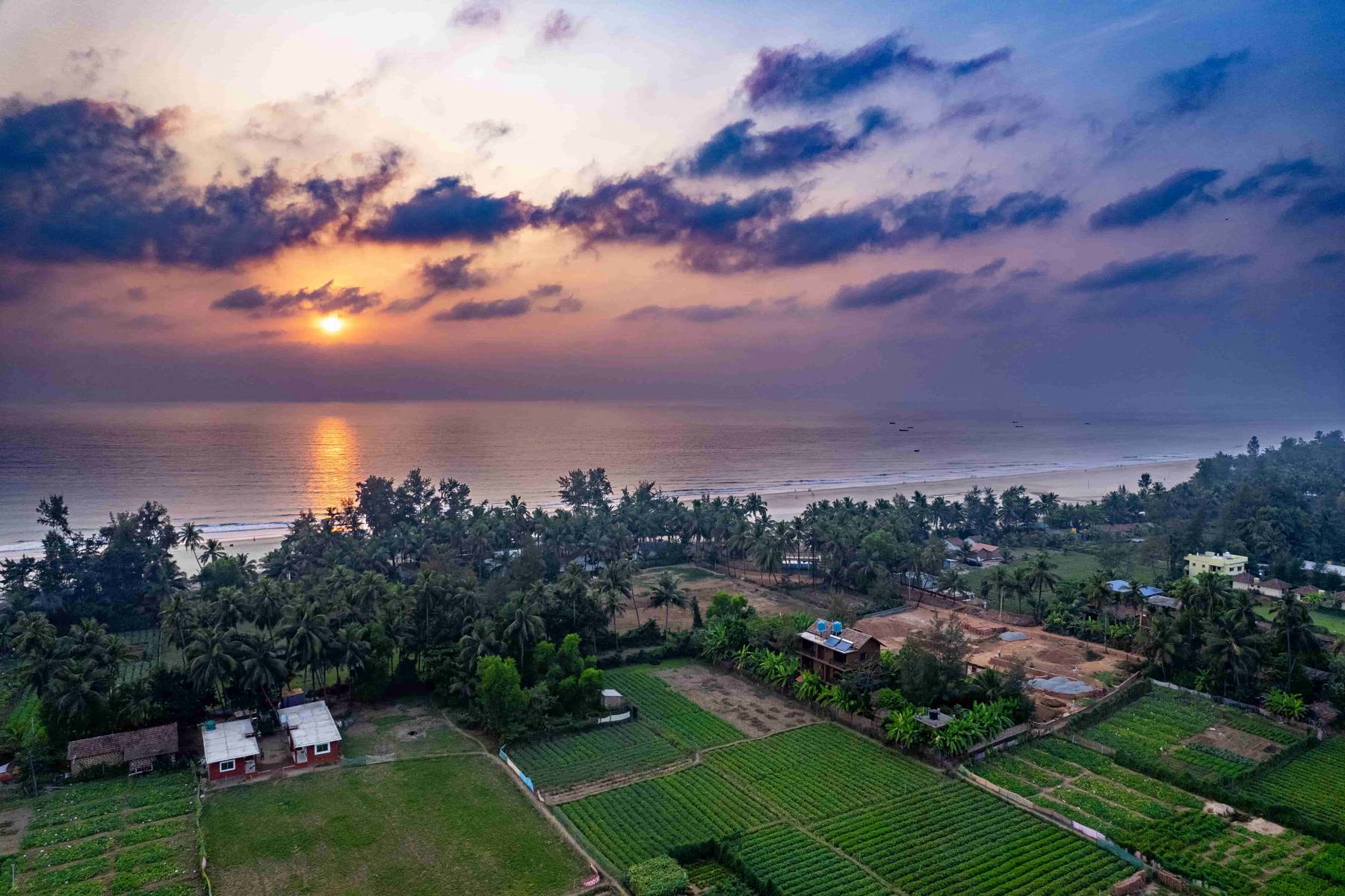Sunset over the farms and Middle Beach, Gokarna